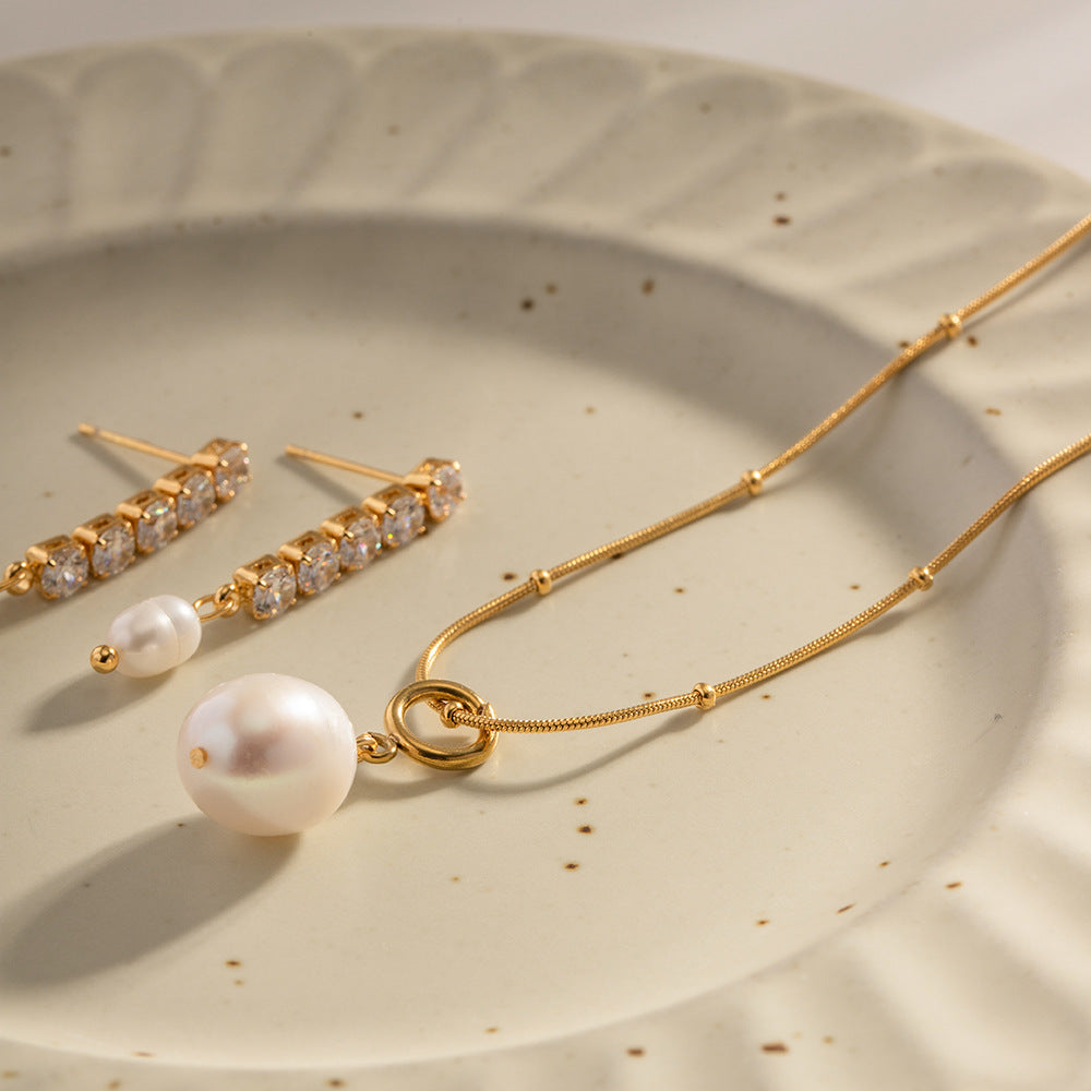 Damen Halskette mit eleganten Perlenanhänger und hochwertiger Edelstahlverarbeitung Shop Nory