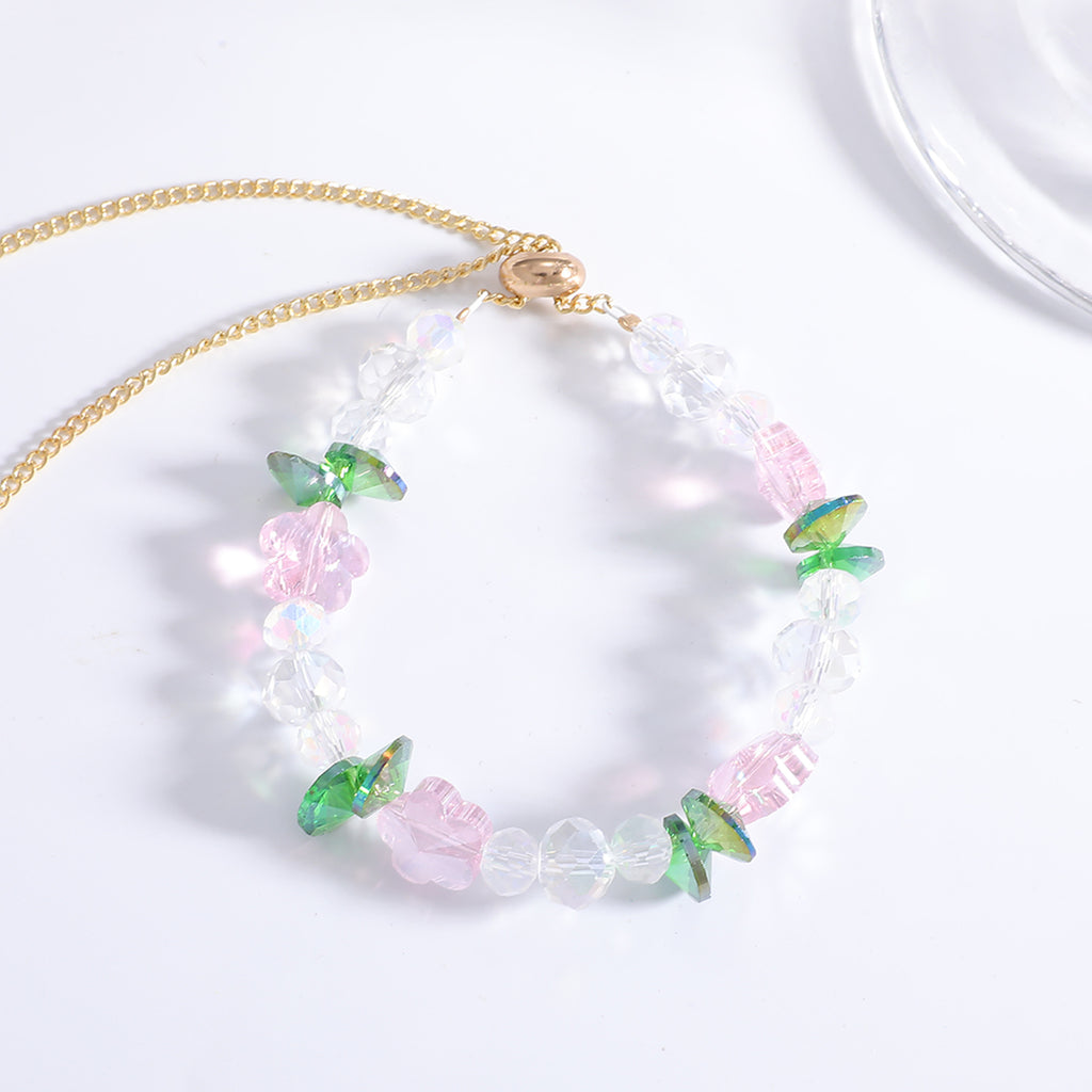 Damen Halskette mit funkelnden Kristallperlen und floralen Akzenten Shop Nory