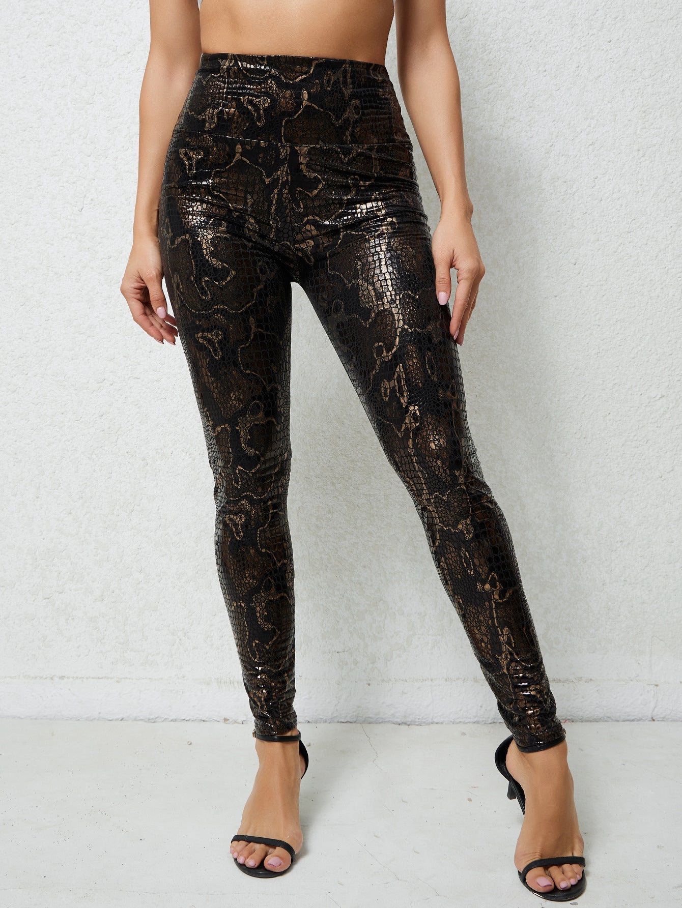 Damen Hochglänzende Leggings im Schlangenmuster
