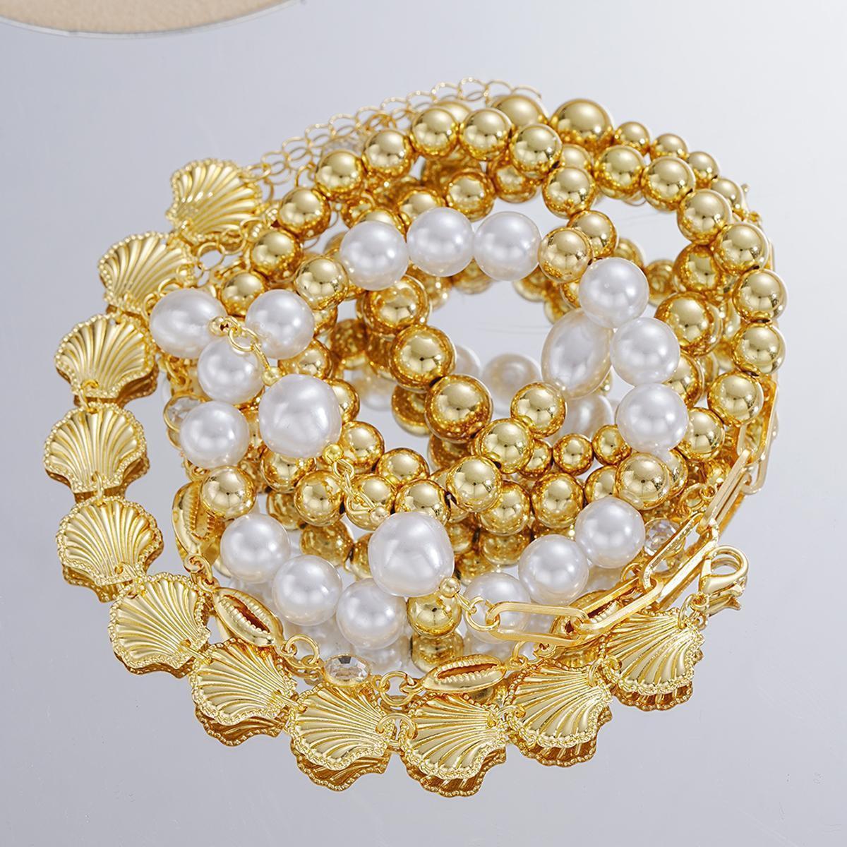 Damen Armband-Set mit luxuriösen Perlen und maritimen Muschelanhängern Shop Nory