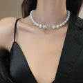 Damen elegante Perlenhalskette mit modischem Verschluss Shop Nory