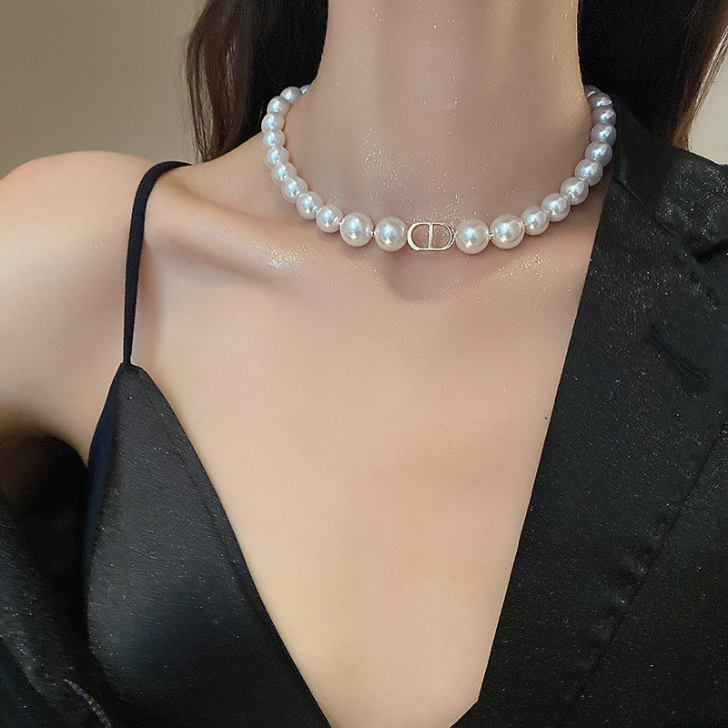 Damen elegante Perlenhalskette mit modischem Verschluss Shop Nory