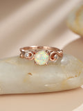 Damen Ring mit funkelndem Opal und eleganten Zirkonia-Akzenten Shop Nory