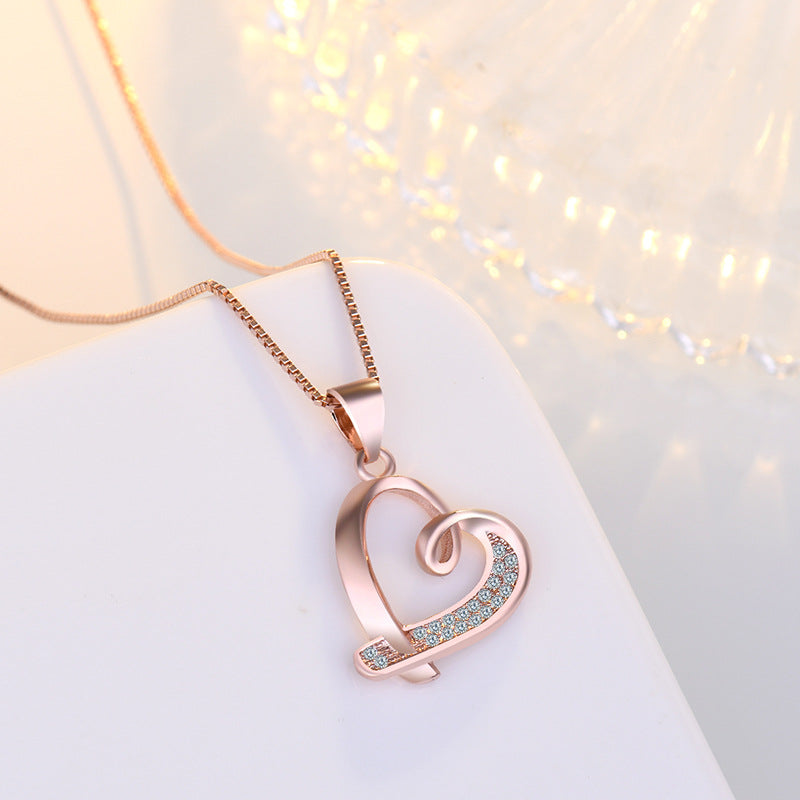 Damen Halskette mit elegantem Herzanhänger und funkelnden Zirkonia Shop Nory
