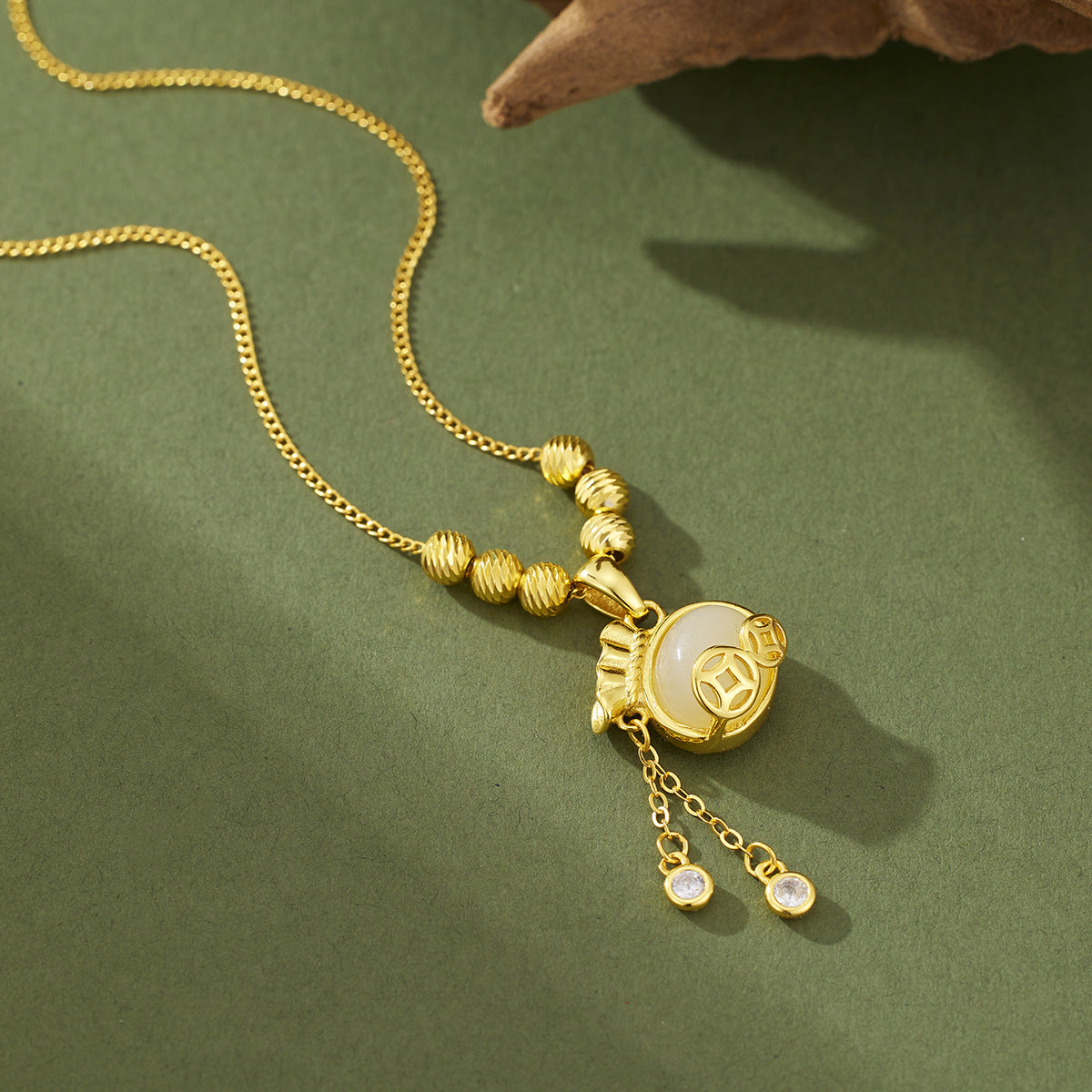Damen Halskette mit kunstvollem Anhänger aus hochwertigem goldfarbenen Metall und Zirkonia-Details Shop Nory