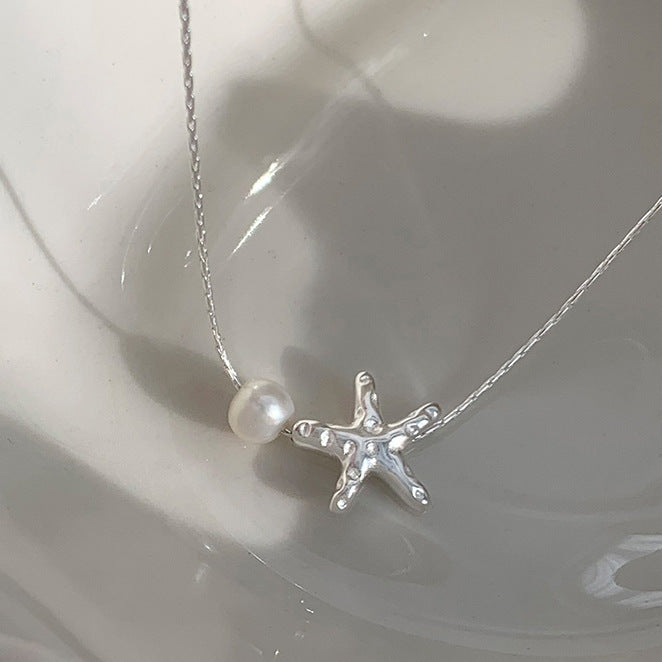 Damen Anhänger mit Sternenmotiv und Perle Shop Nory