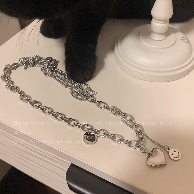 Damen Kette mit charmantem Herzen- und Smiley-Anhänger Shop Nory