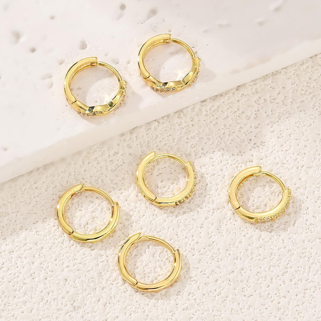Damen Ohrstecker-Set mit funkelnden Zirkonia und geschwungenem Design Shop Nory