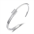 Damen Offenes Armband mit kunstvollem Spiral-Design Shop Nory
