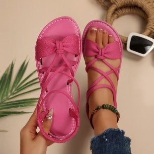 Damen Zarte Römersandalen mit Schleifen-Detail und verstellbaren Schnürriemen Shop Nory