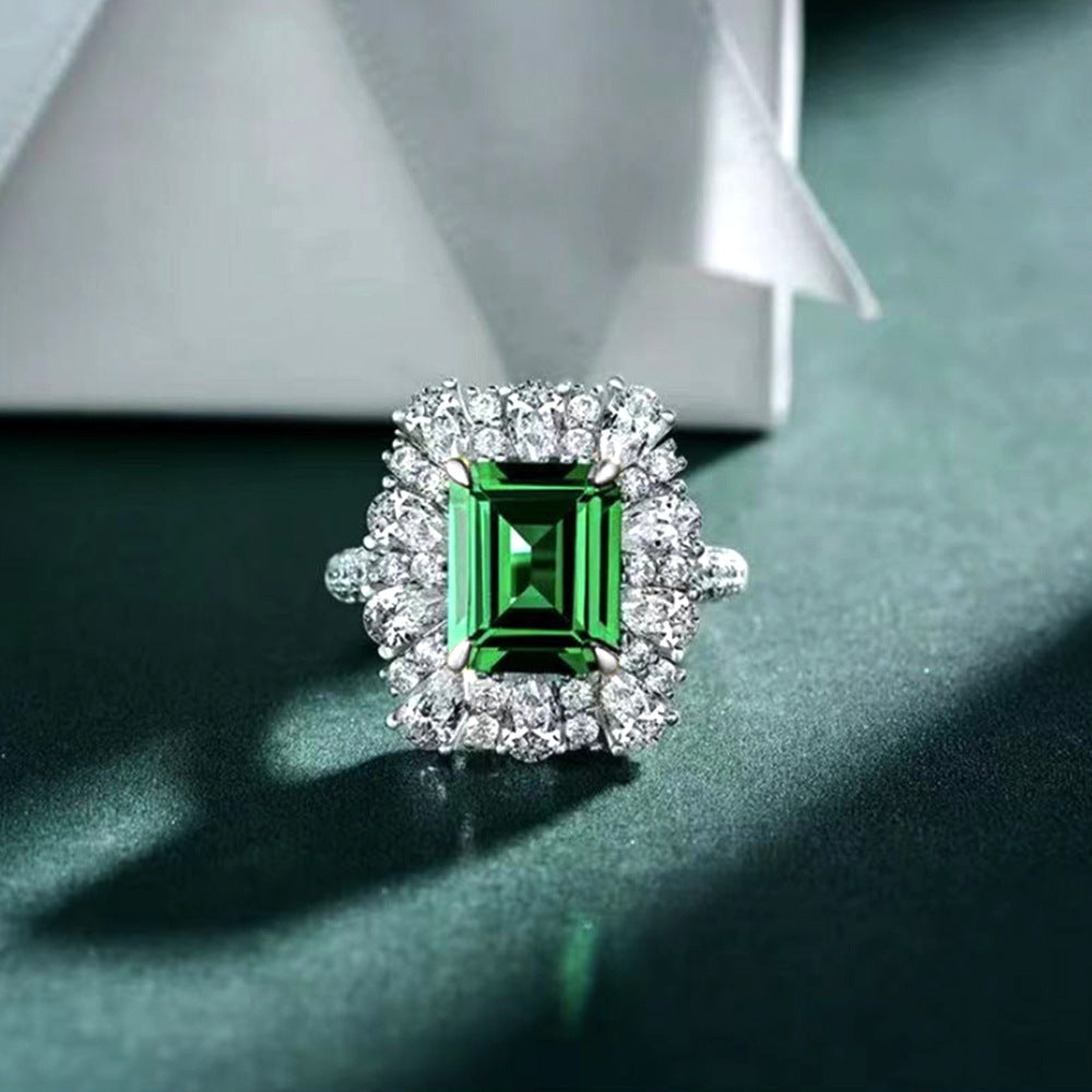 Edelstein-schneider Halo Cocktailring mit Sterlingsilberband und simuliertem Mittelpunktstein sowie Birnen-förmigem Halo