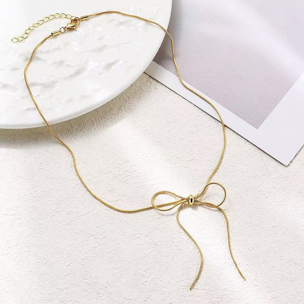 Damen Kette mit funkelndem Schleifenanhänger Shop Nory