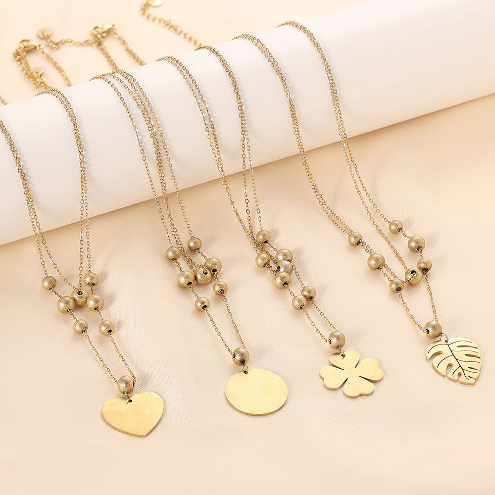 Damen Halskette mit herzförmigem Anhänger und eleganten Perlen Shop Nory