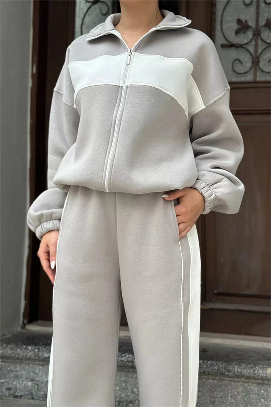 Damen Komfortables Campus-Lounge-Set mit kurzem Reißverschluss-Top und Seitenstreifen-Jogger Shop Nory