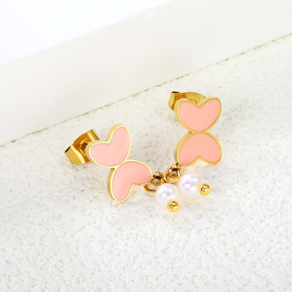 Damen Ohrringe mit modernen Herz-Akzenten und Perlenschmuck Shop Nory
