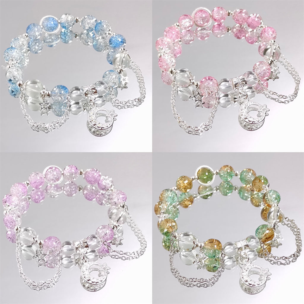 Damen Armband mit funkelnden Kristall-Elementen und charmanten Anhängern Shop Nory