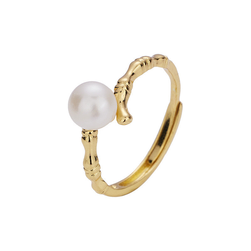 Damen Zierlicher Ring mit hochwertiger Perle und kunstvoller Fassung Shop Nory