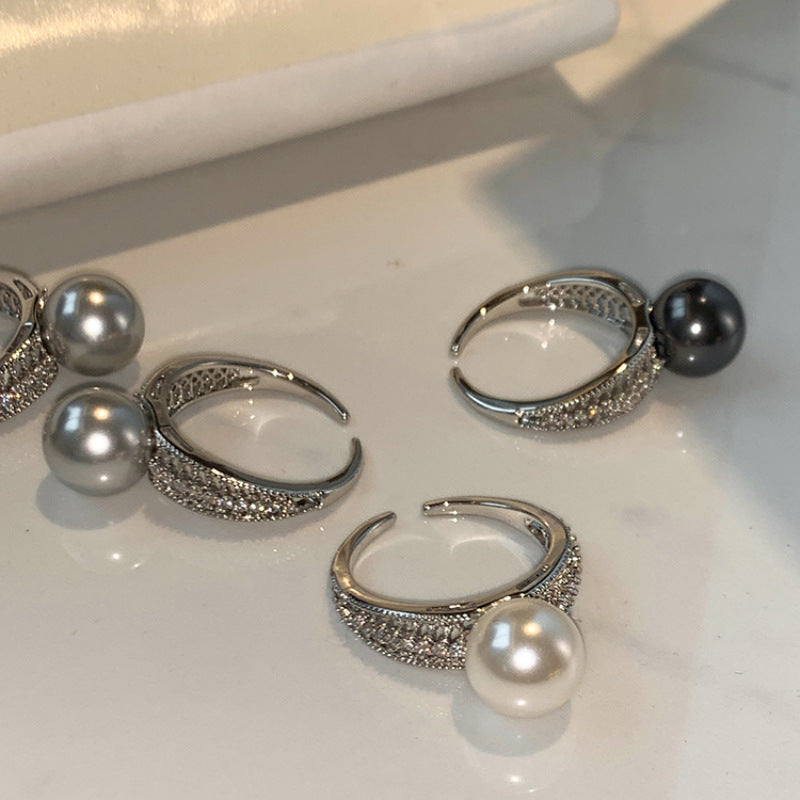 Damenring mit elegantem Perlencap und funkelnden Zirkonia Shop Nory