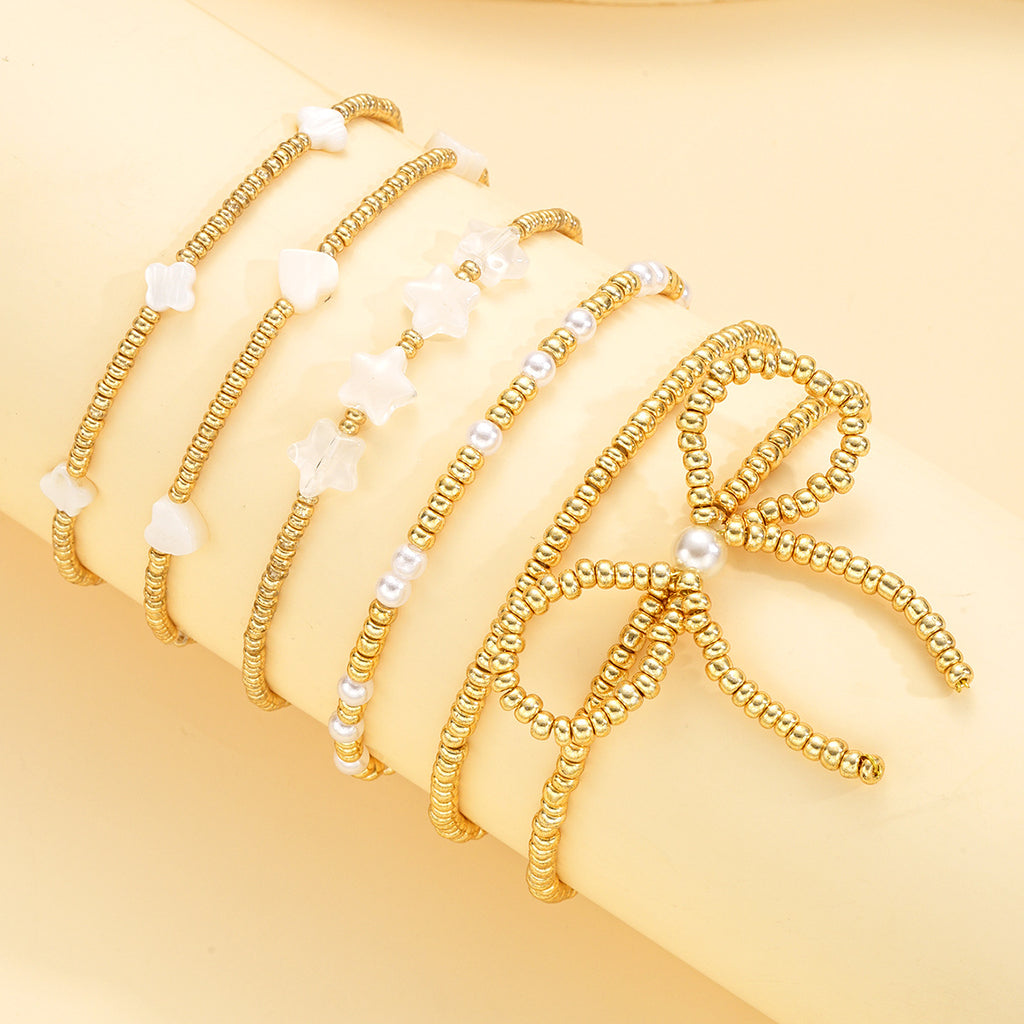 Damen Armreif-Set mit kreativen Perlen und zarten Sternenmotiven Shop Nory
