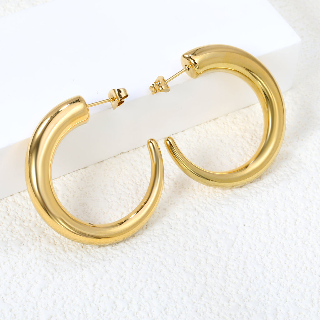 Damen elegante goldplattierte Creolen Shop Nory