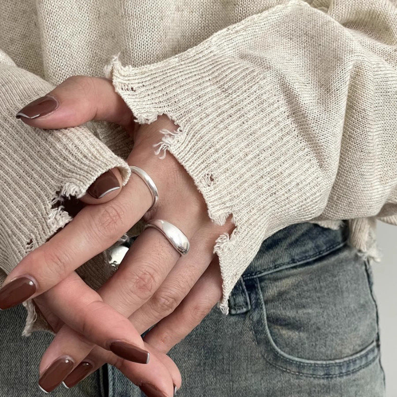 Damenring mit modernem, geschwungenem Design und glänzender Oberfläche Shop Nory