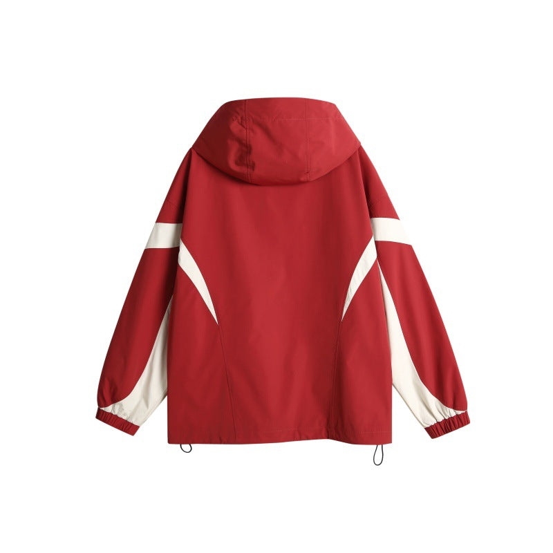 Unisex Technische Kapuzen‑Windbreakerjacke im Boxy‑Cut mit kontrastierenden Paneelen und wasserabweisenden Reißverschlüssen Shop Nory