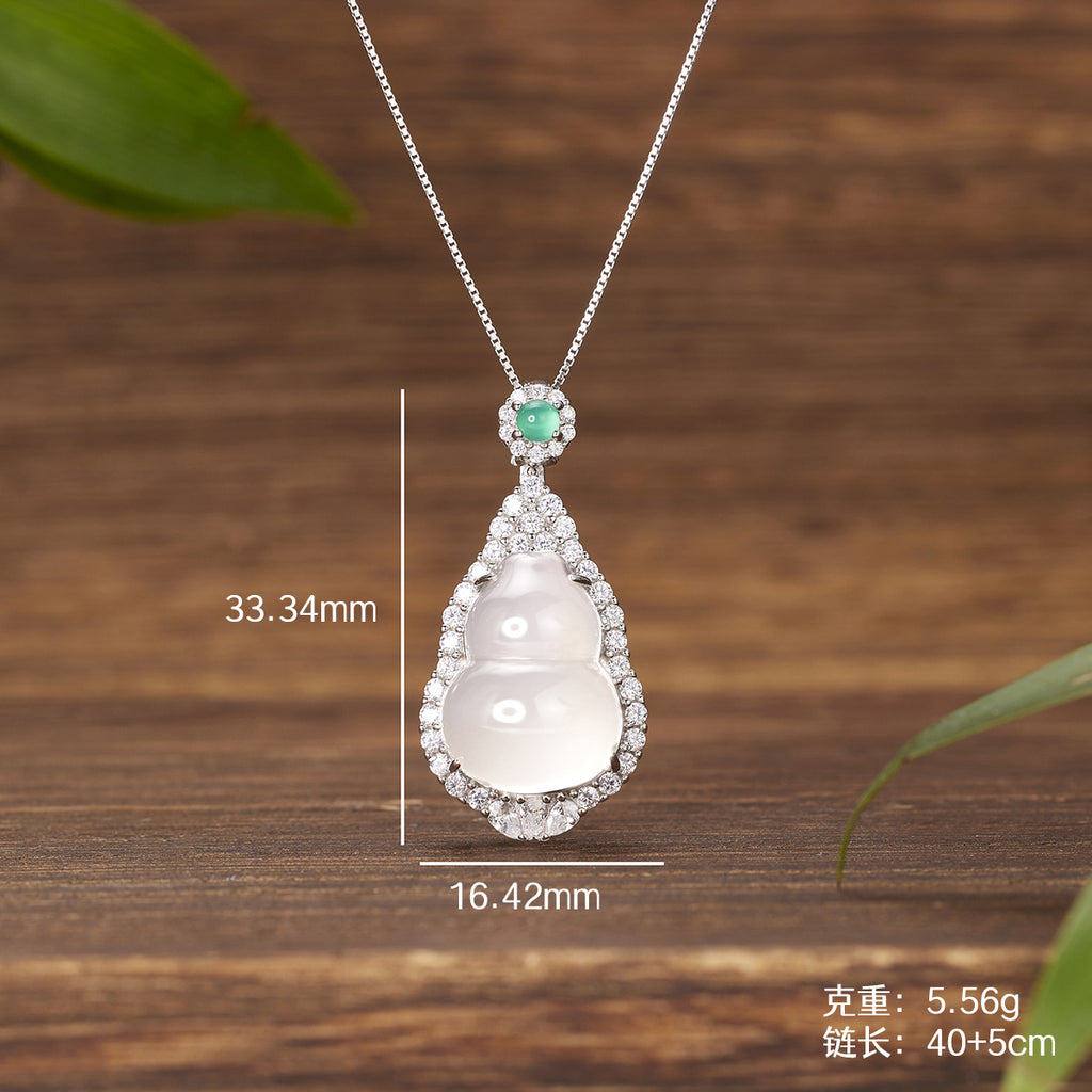 Damen elegante Halskette mit kunstvollem Muschel-Anhänger und funkelnden Zirkonia Shop Nory
