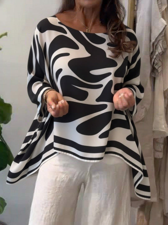Damen Oversize Sommerbluse mit abstraktem Print, Fledermausärmeln und asymmetrischem Saum Shop Nory