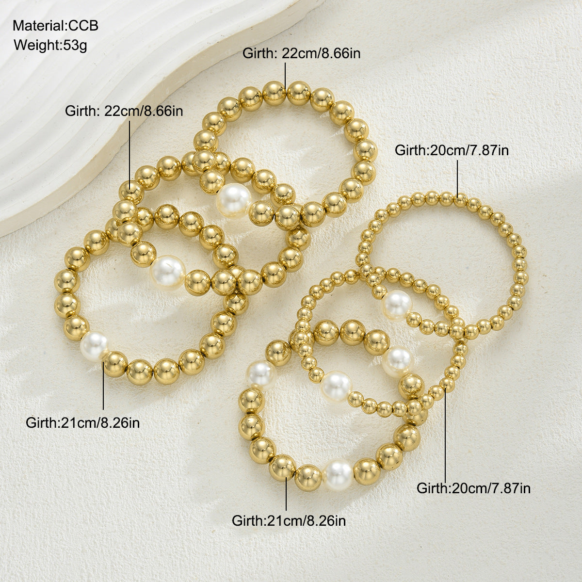 Damen Armband-Set mit glänzenden Perlen und goldenen Akzenten Shop Nory