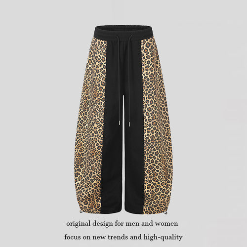 Damen Extraweite Palazzo-Joggpants mit Leo-Panelen, Tunnelzugbund und verstellbarem Saum Shop Nory
