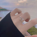 Damen eleganter und zarter Ring mit Stern- und Blütenmotiven Shop Nory