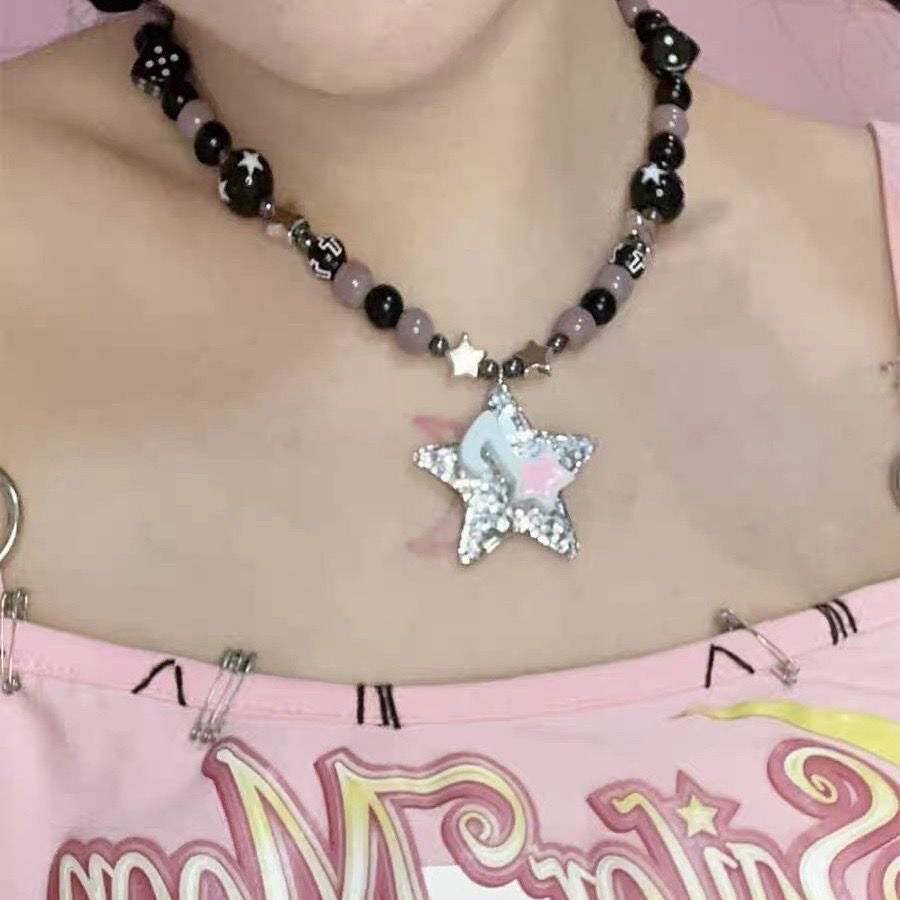 Damen Kette mit funkelndem Sternenanhänger und bunten Perlen Shop Nory