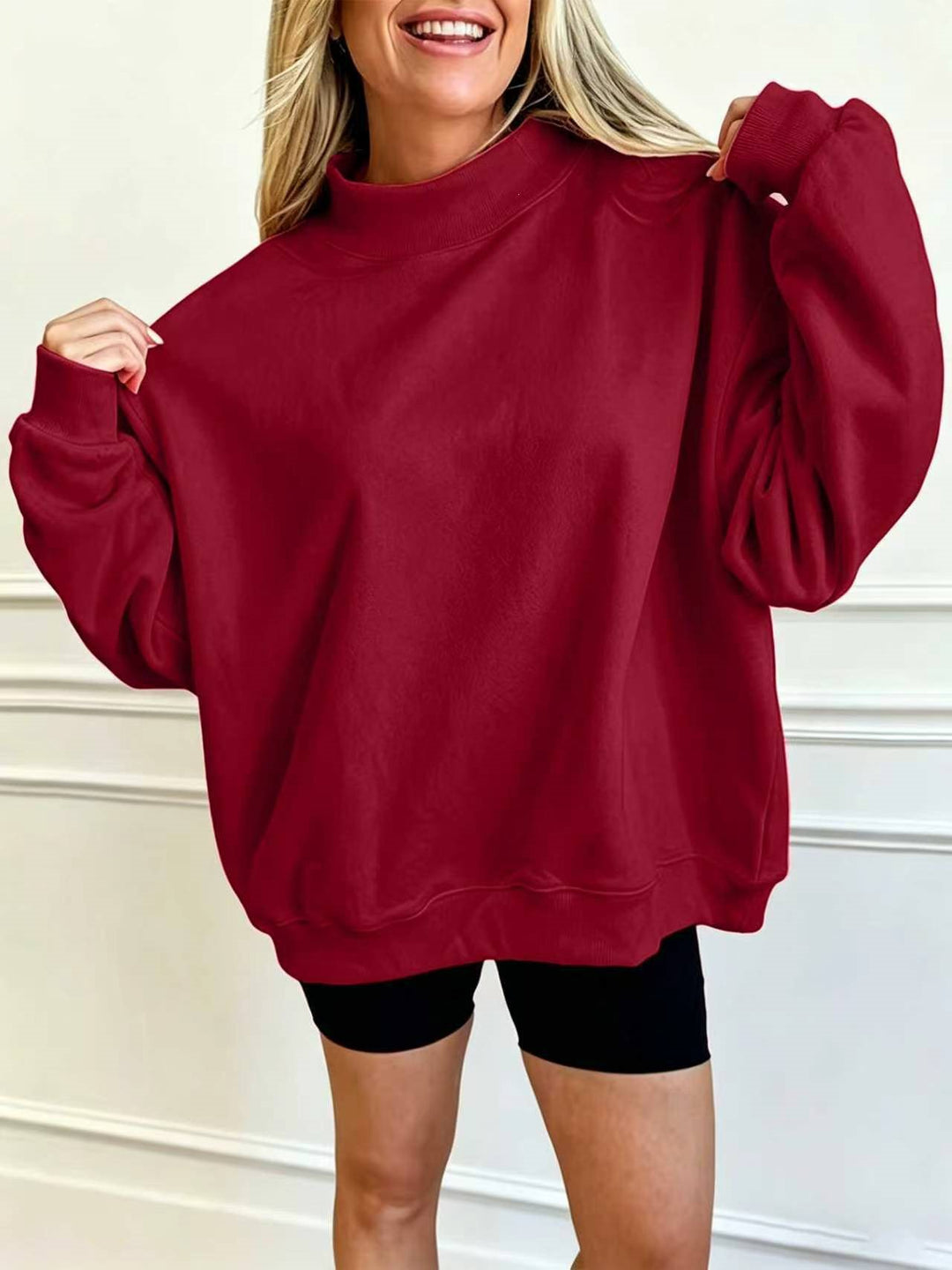 Damen Oversize Sweatshirt mit Stehkragen und Ballonärmeln Shop Nory