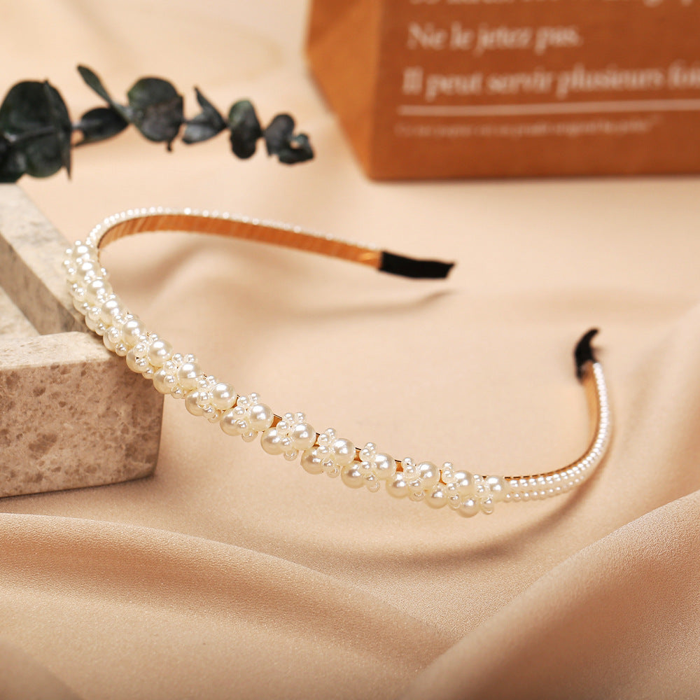 Damen Haarband mit eleganten Perlenverzierungen Shop Nory
