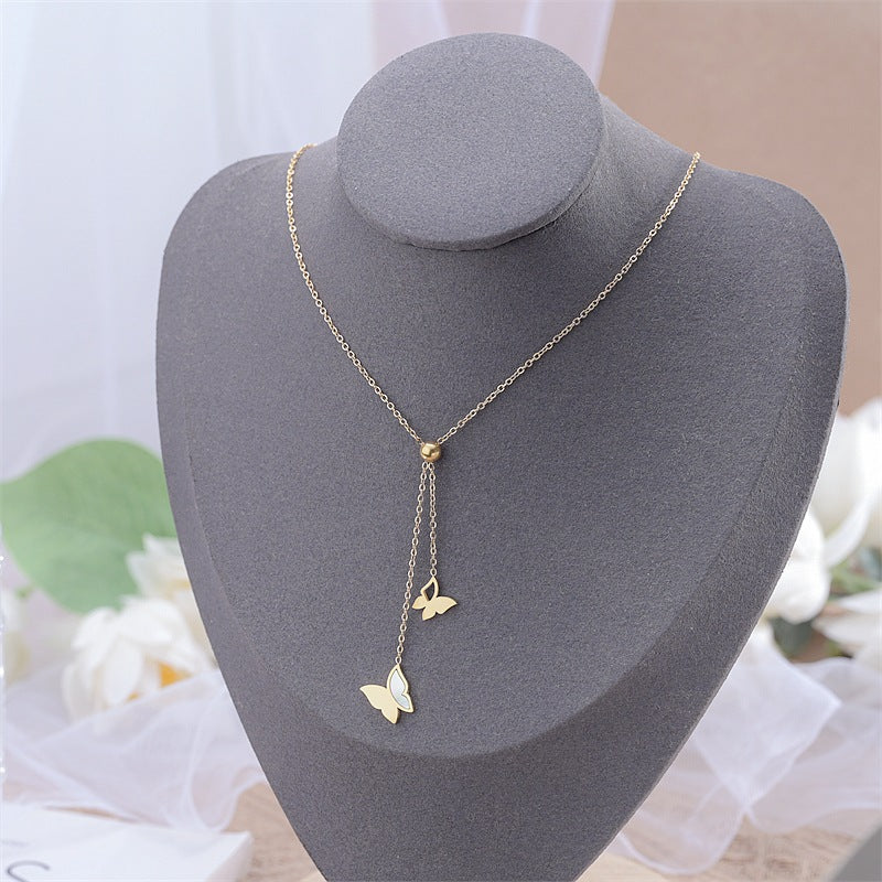 Damen Halskette mit elegantem Schmetterlingsanhänger und funkelnden Akzenten Shop Nory