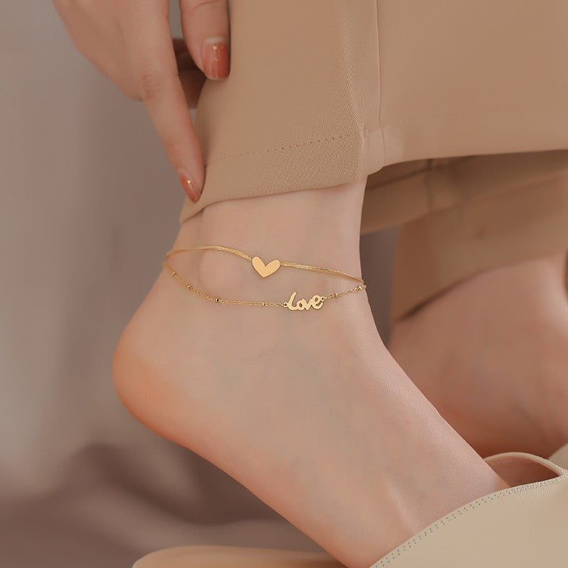 Damen Armkette mit verspieltem Herz- und Schriftzugdesign Shop Nory