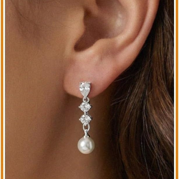 Damen Ohrhänger mit funkelnden Swarovski-Kristallen und eleganter Perlenakzent Shop Nory