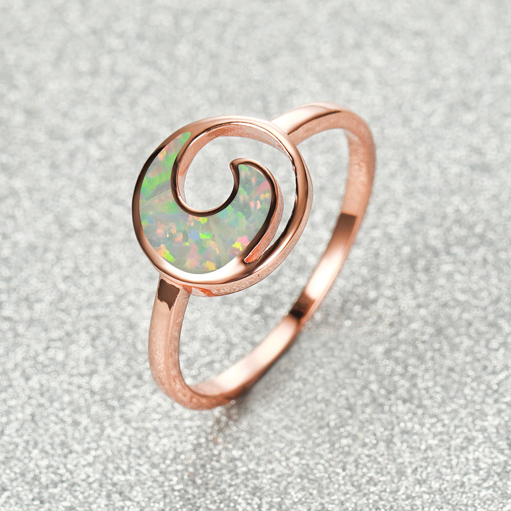 Damen Ring mit eleganter Spiralform und schimmerndem Opal Shop Nory