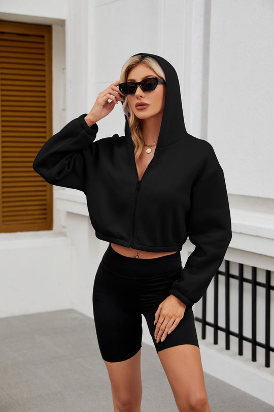 Damen Cropped Kapuzenjacke mit durchgehendem Reißverschluss und oversized Ärmeln Shop Nory