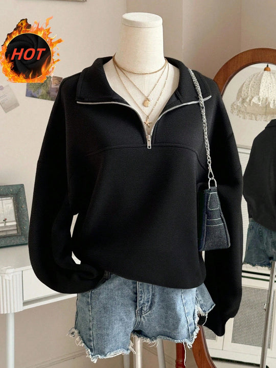 Damen nan Oversize Sweatshirt mit halbem Reißverschluss, Stehkragen und Ballonärmeln Shop Nory