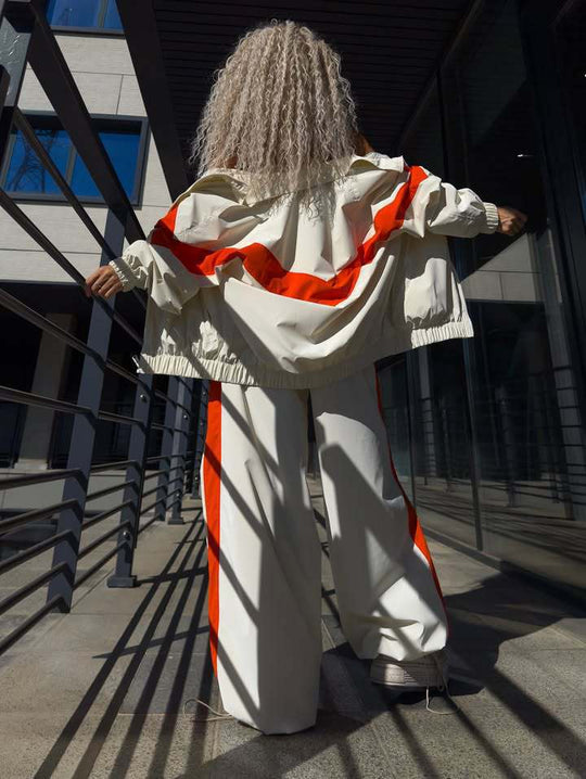 Damen leichte Oversize-Windbreakerjacke mit Kontrastpanelen, Tunnelzugbund und elastischen Bündchen Shop Nory