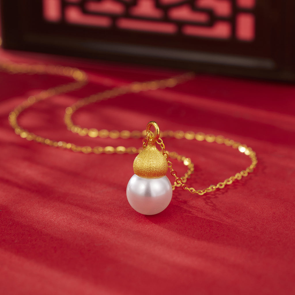 Damen elegante Halskette mit einzigartigem Perlenanhänger und goldener Detailverarbeitung Shop Nory