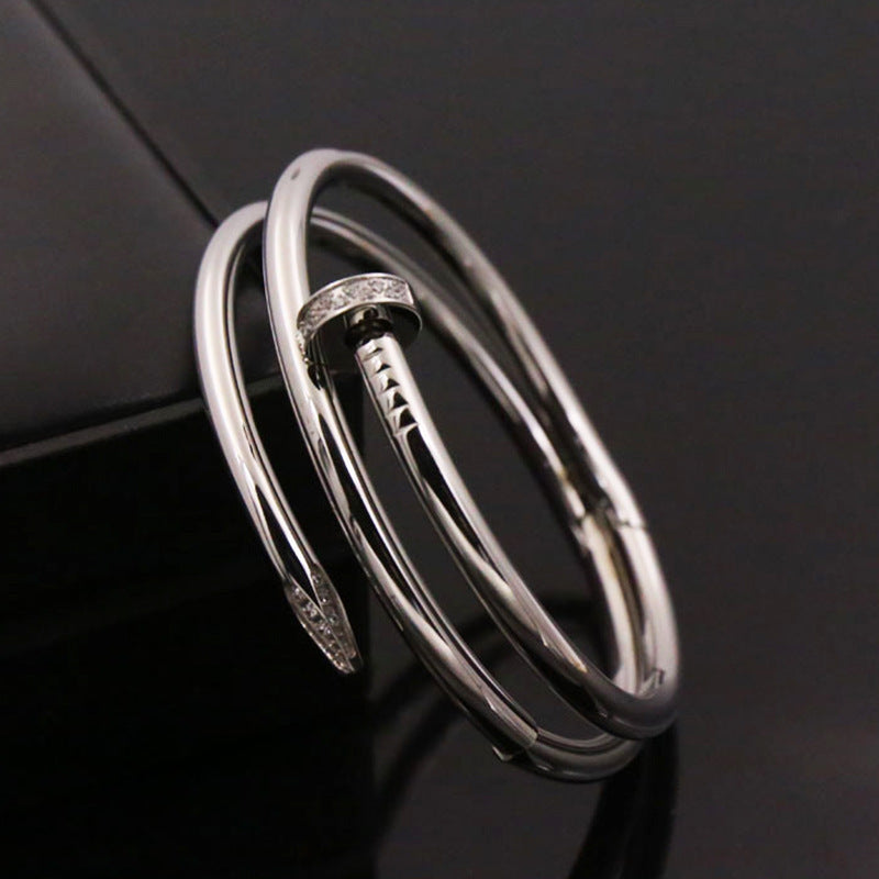 Damenring mit modernem geschwungenem Design und Zirkonia-Besatz Shop Nory