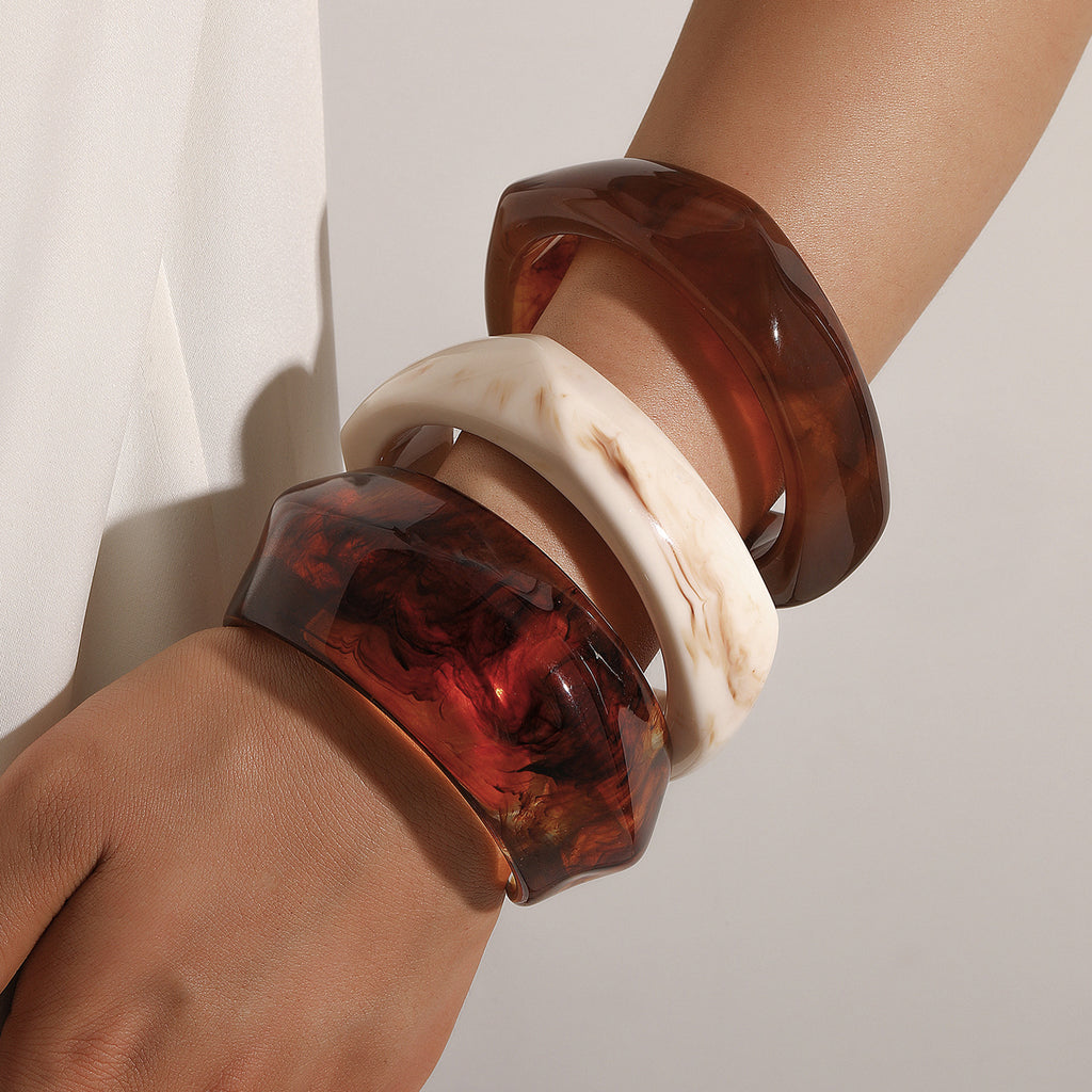 Damen elegantes Acrylarmband mit geschwungenem Design Shop Nory
