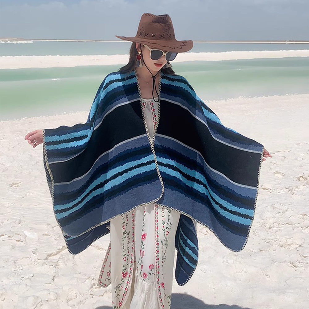Damen Oversize-Strickponcho mit mehrfarbigem Wellenstreifen und Zierkordkante Shop Nory