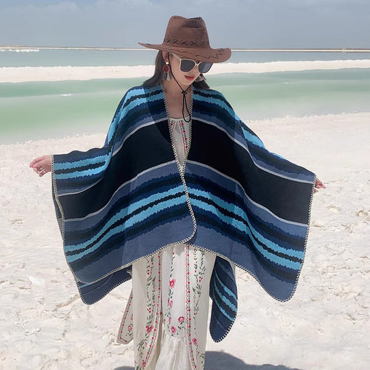 Damen Oversize-Strickponcho mit mehrfarbigem Wellenstreifen und Zierkordkante Shop Nory