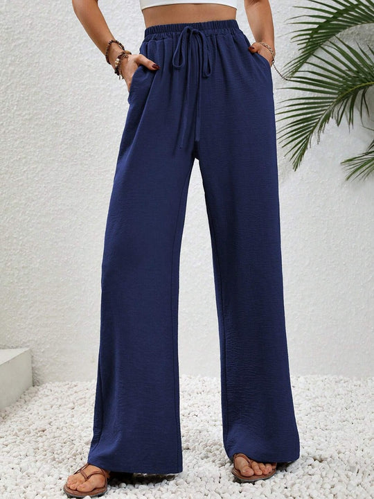 Damen Leichte, weit geschnittene Strandhose mit Elastikbund, Kordelzug und Seitentaschen Shop Nory