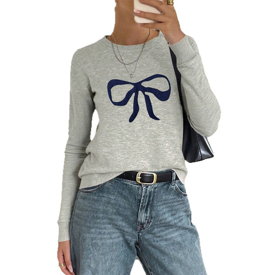 Damen nan Feinstrickpullover mit großem Schleifenprint, Rundhalsausschnitt und schmaler Passform Shop Nory