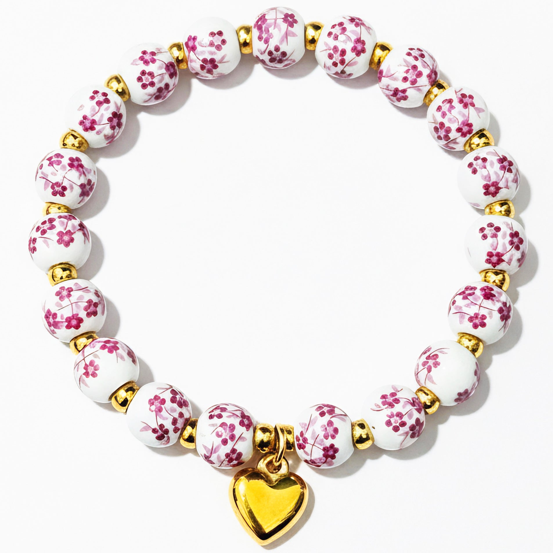 Damenarmband mit floralem Design und goldenen Akzenten Shop Nory