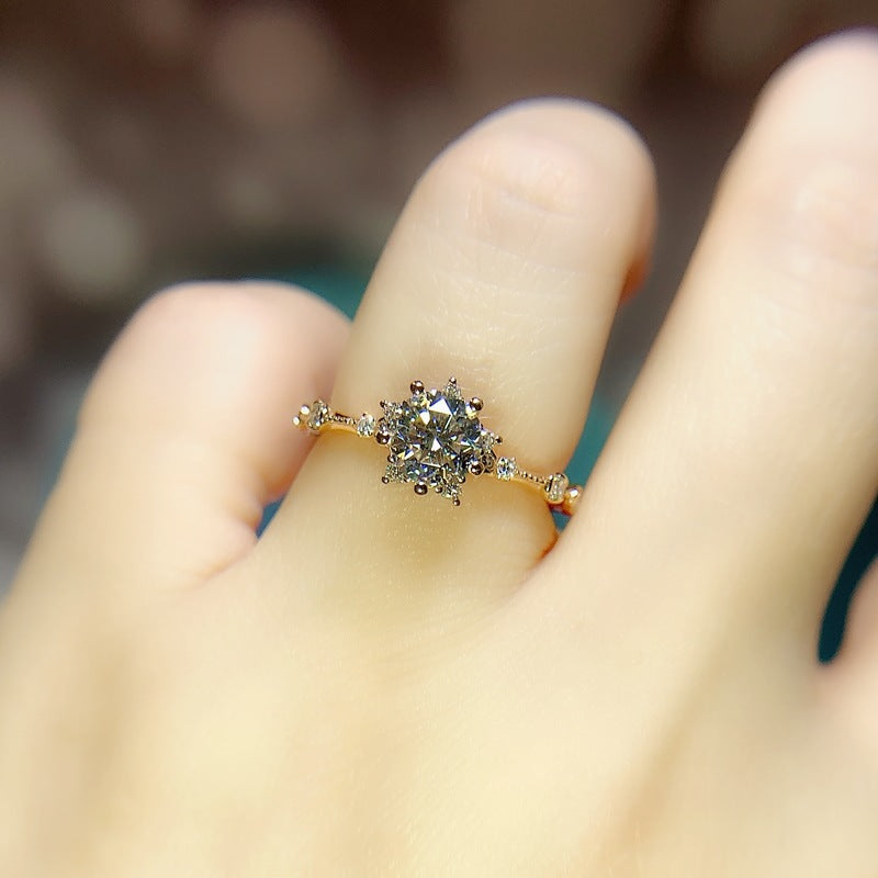 Damen Verlobungsring mit floralem Design und funkelndem Zirkonbesatz Shop Nory